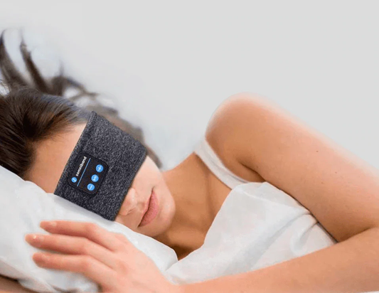 Picture of woman sleeping with the SomniBand Sleep Headphones used for helping tinnitus, insomnia and other sleep related problems.